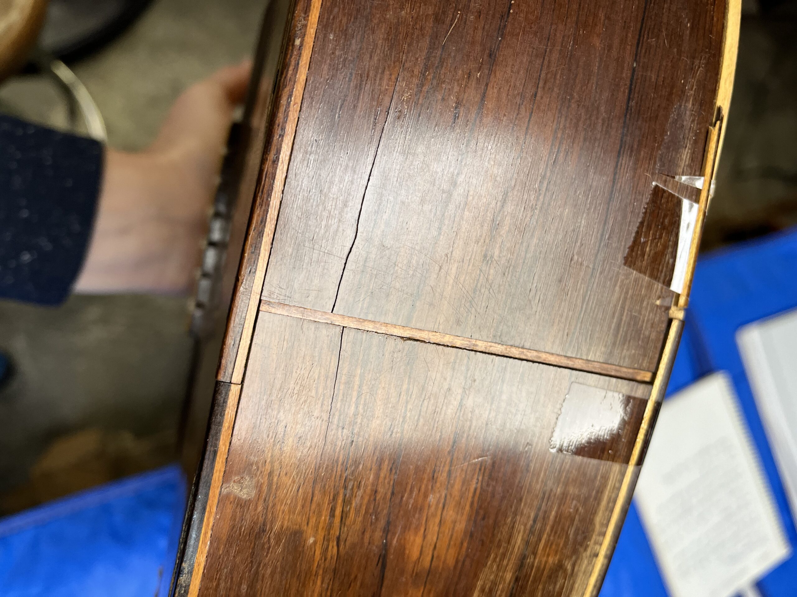Broken and deformed side of the 1924 Santos Hernández guitar before restoration