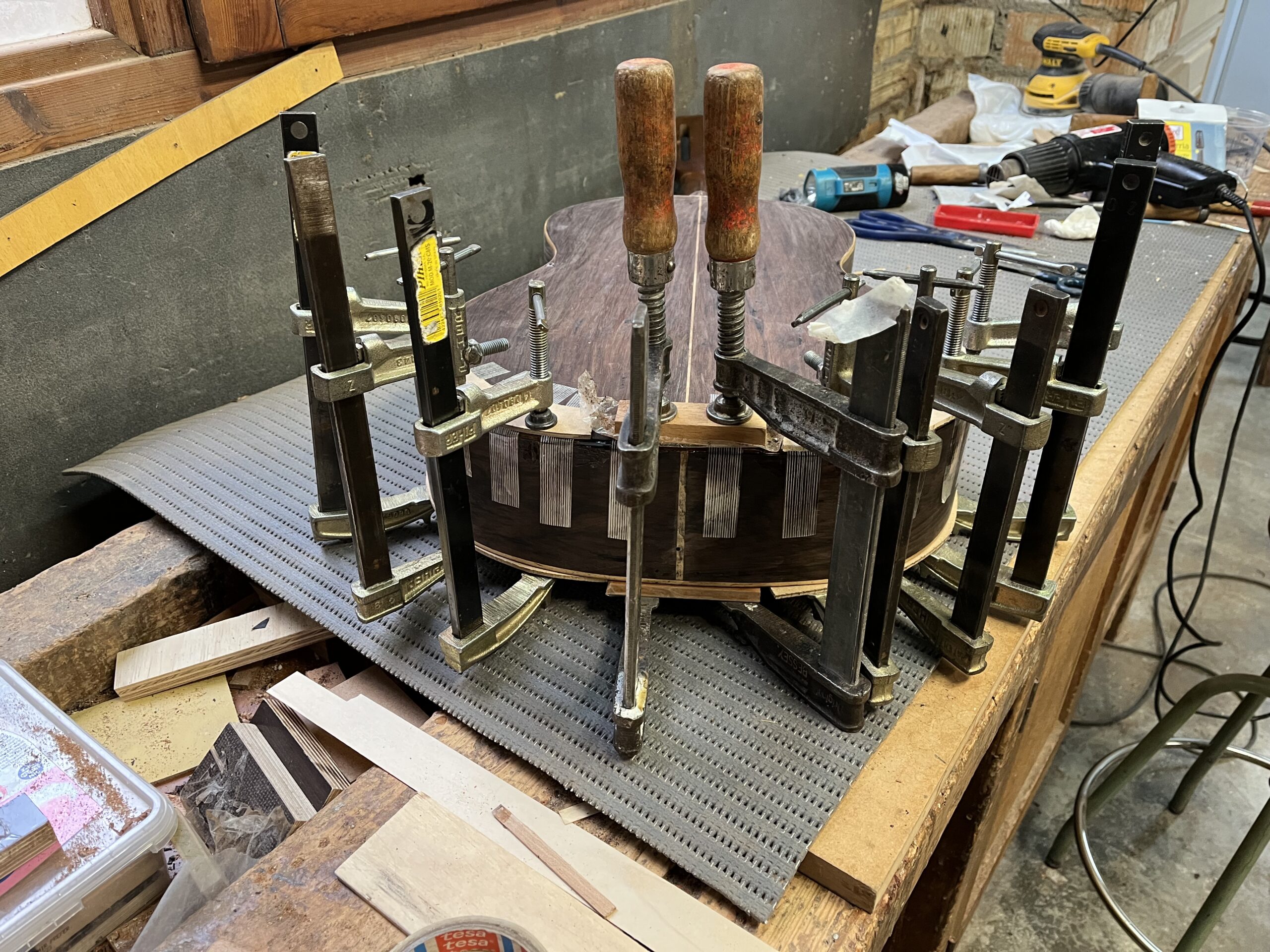 Regluing during restoration of the 1933 José Ramírez guitar
