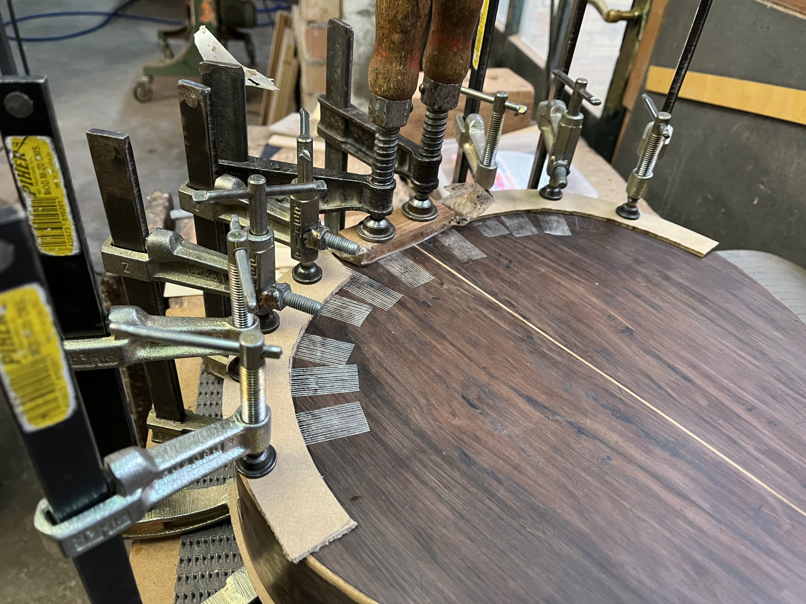 Repairing the back of the 1933 José Ramírez guitar