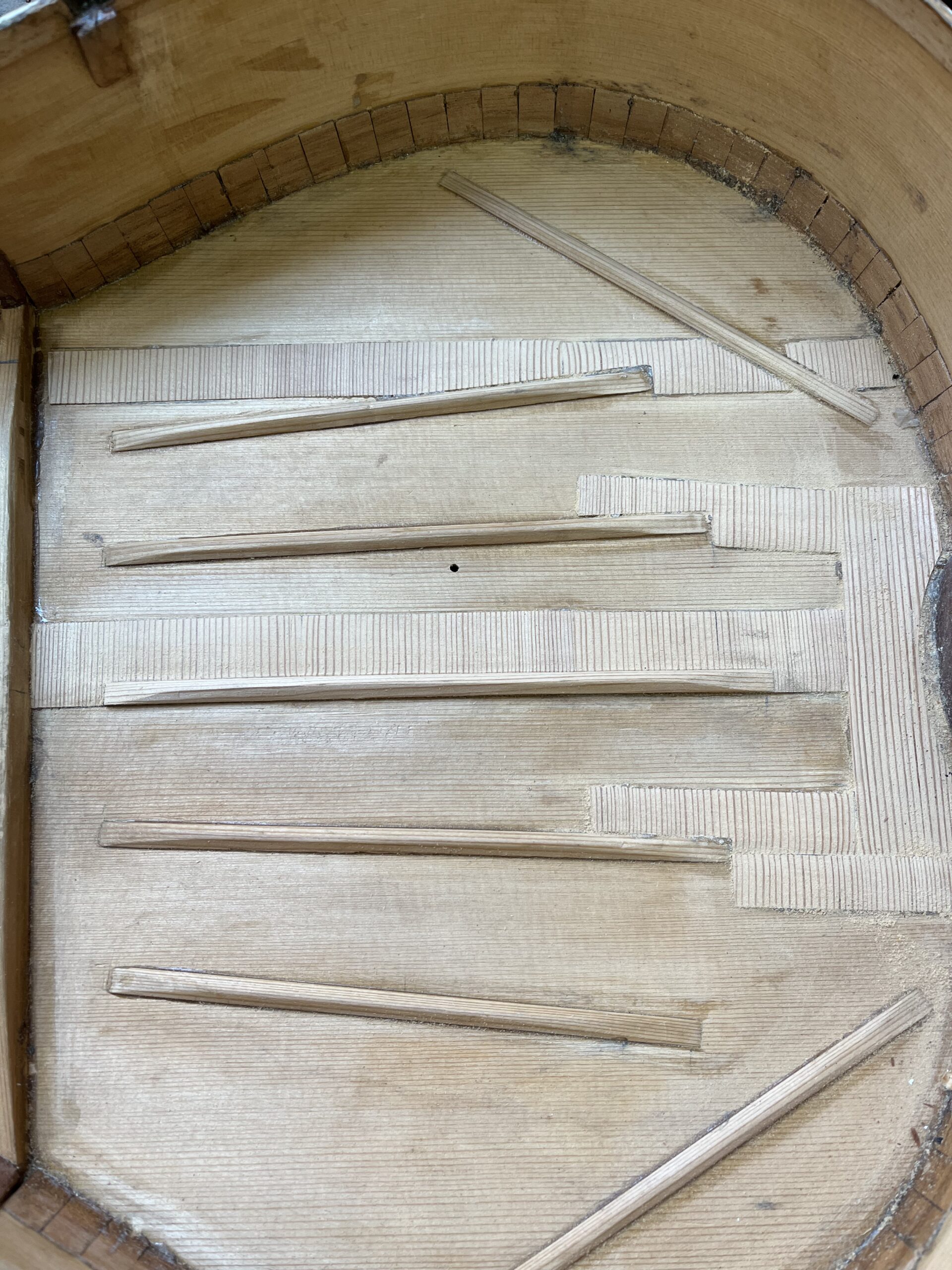 Detail of the lightweight reinforcement fitted to the weakened soundboard area