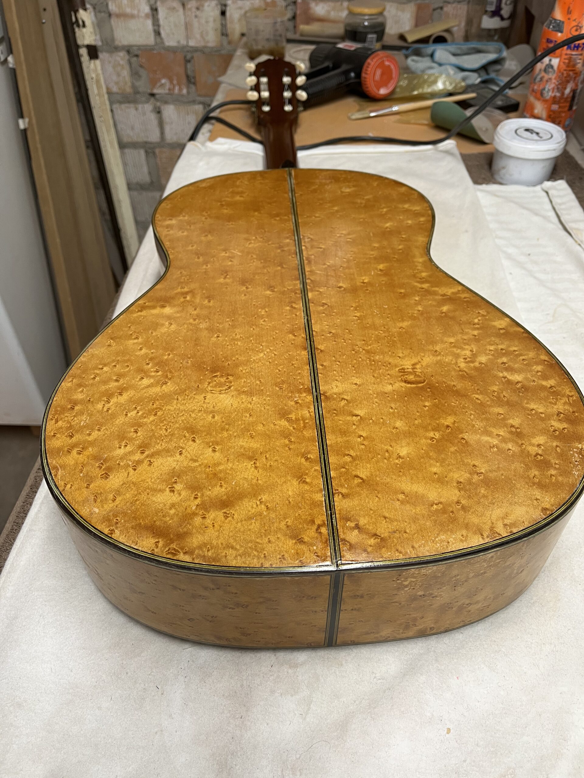 Detail of the figured maple used for the back of the guitar